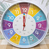 Colorful clock with a cartoon character on a neutral background Educational clock with colorful hands and numbers on a white background time teacher 300mm wide