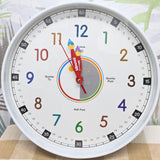 Educational clock with colorful hands and numbers on a white background time teacher 300mm wide