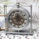 Silver mechanical clock with a decorative background