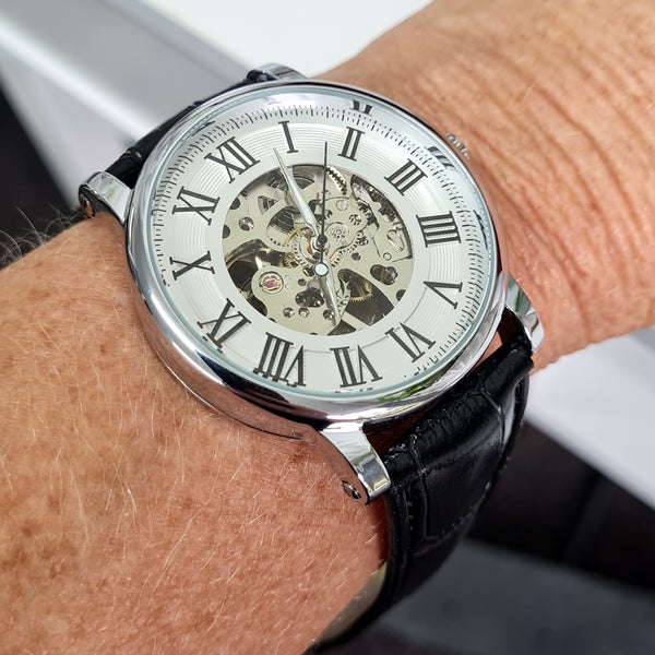 Mechanical watch with Roman numerals on a wrist