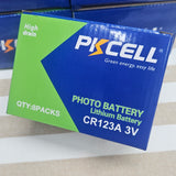 PKCELL photo battery packaging on a striped fabric background